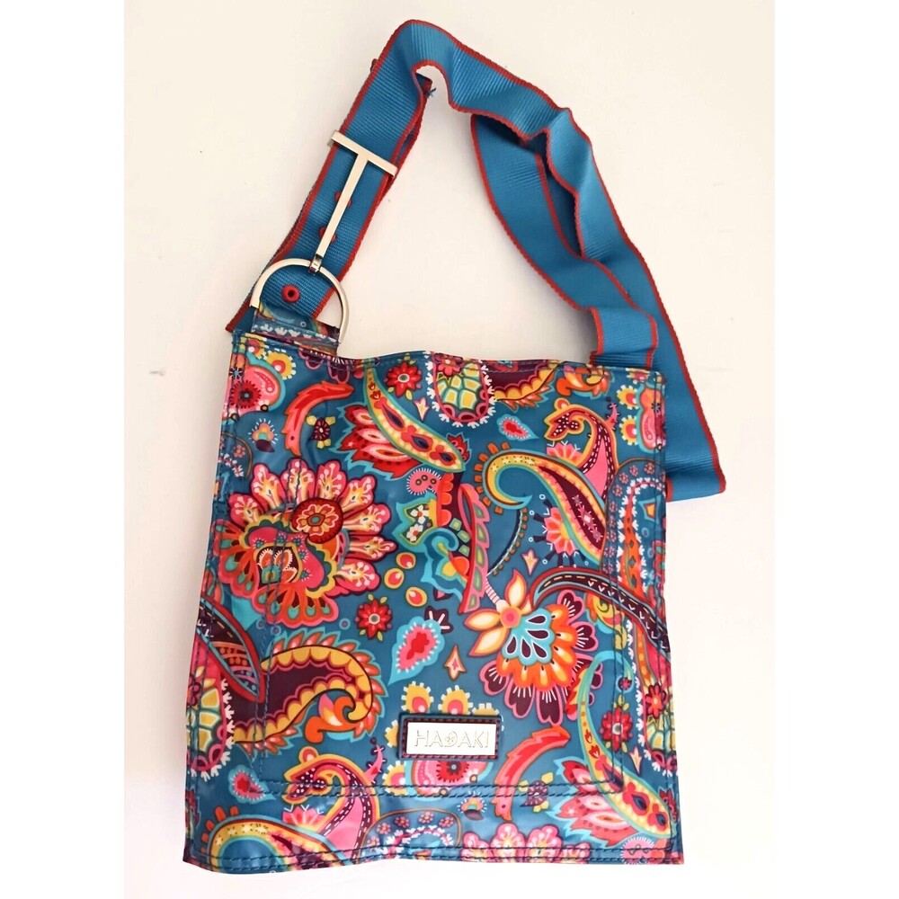 NEW Hadaki Slim Crossbody Blue Floral Coated Canvas Adj Web Strap 10X11